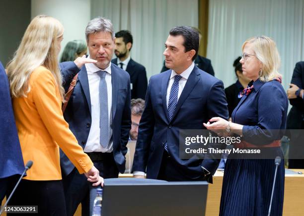 Commissioner for energy Kadri Simson talks with the German Minister for Economic Affairs and Climate Action Robert Habeck, the Greek Minister of the...