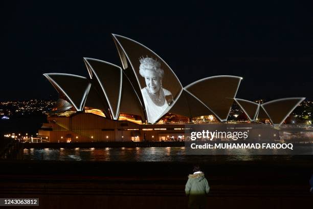 Australia iconic Opera House sails lit up with the picture of Britain's Queen Elizabeth II to commemorate her life on September 9 in Sydney.