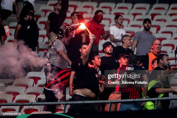 Fans Nice throws a flares before the UEFA Europa Conference League match between Nice and Koln at Allianz Riviera Stadium on September 8, 2022 in...
