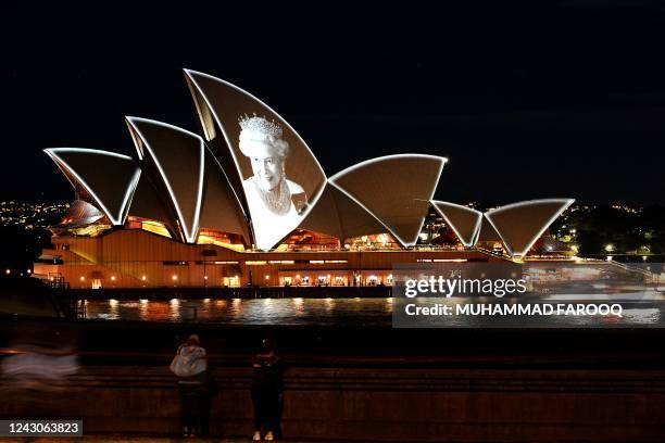 Australia iconic Opera House sails lit up with the picture of Britain's Queen Elizabeth II to commemorate her life on September 9 in Sydney.