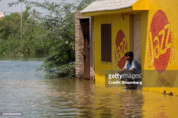 Flooded house with advertisement of Pakistan Mobile Communications Limited 'Jazz' near Indus River in Jamshoro district of Sindh, Pakistan, on...