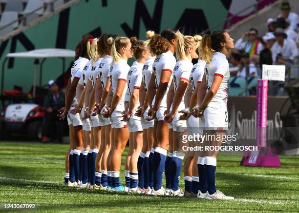 England's women players have a moment of silence to mark the passing of Queen Elizabeth II during the Rugby World Cup Sevens tournament, in Cape Town...