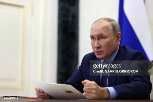 Russian President Vladimir Putin chairs a Security Council meeting via a video link at the Kremlin in Moscow on September 9, 2022.