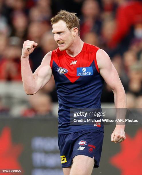 Harrison Petty of the Demons celebrates a goal during the 2022 AFL Second Semi Final match between the Melbourne Demons and the Brisbane Lions at the...