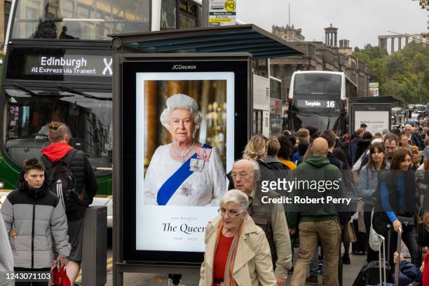 Pictures of Queen Elizabeth II on bus shelters on Princes Street on September 9th 2022 in Edinburgh, Scotland. Elizabeth Alexandra Mary Windsor was...