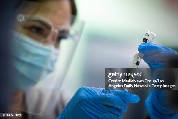 Los Angeles, CA Encino, CA Ria Garcia, an LVN with Los Angeles County Department of Public Health, draws up monkeypox vaccines at the Balboa Sports...