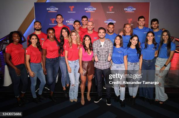 Exatlon Estados Unidos contestants pose on stage with hosts Chelly Cantu and Frederik Oldenburg during the Telemundo Miami press event to reveal the...