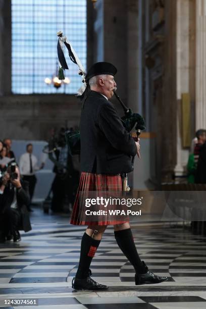 Piper plays during a service of prayer and reflection, following the passing of Britain's Queen Elizabeth, at St Paul's Cathedral on September 9,...