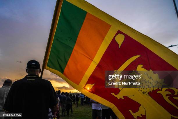 Anti-government protester with Sri Lankan Flag at Galle Face. September 09, 2022 Colombo, Sri Lanka.This protest was held to demand the release of...