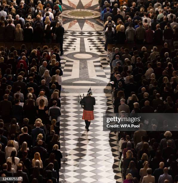 Piper plays during a service of prayer and reflection, following the passing of Britain's Queen Elizabeth, at St Paul's Cathedral on September 9,...