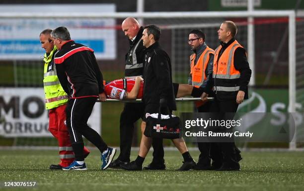 Derry , United Kingdom - 9 September 2022; Ciarán Coll of Derry City leaves the pitch on a stretcher during the SSE Airtricity League Premier...