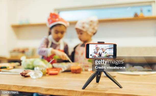 Creative Children Making a Cooking Show with Smartphone