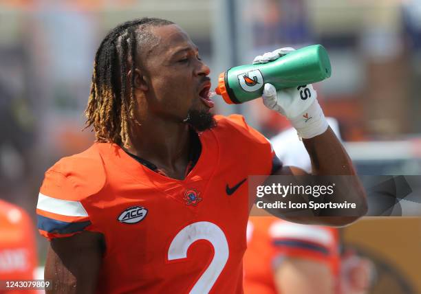 Virginia Cavaliers running back Perris Jones drinks some water on the sidelines during a college football game between the Richmond Spiders and the...