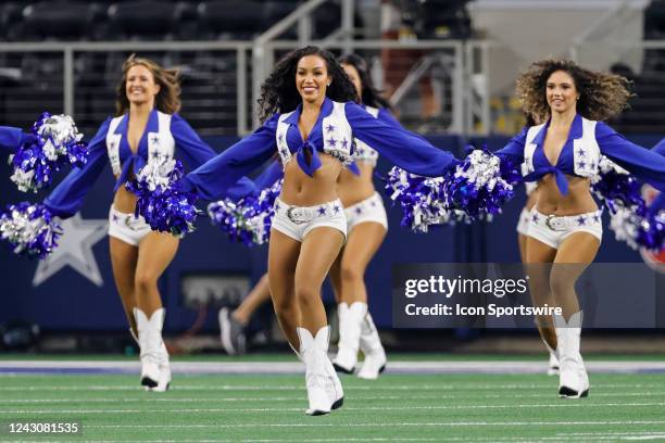 The Dallas Cowboys Cheerleaders perform before the game between the Dallas Cowboys and the Seattle Seahawks on August 26, 2022 at AT&T Stadium in...