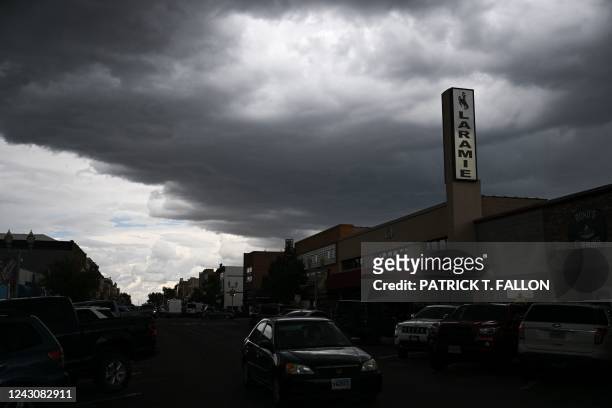 Storm clouds over downtown Laramie, Wyoming on August 13, 2022. - Nearly 25 years ago, the brutal murder of Matthew Shepard -- a gay college student...