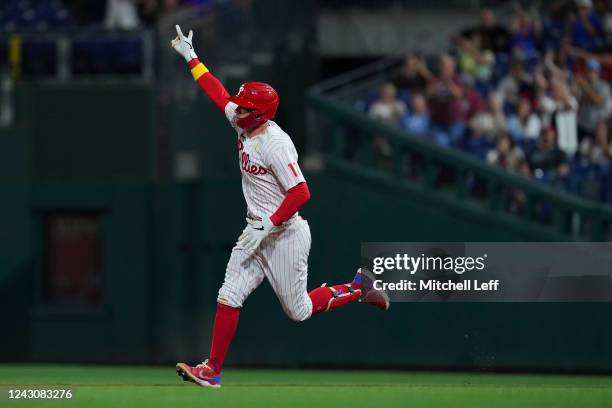 Rhys Hoskins of the Philadelphia Phillies reacts after hitting a solo home run in the bottom of the fourth inning against the Washington Nationals at...