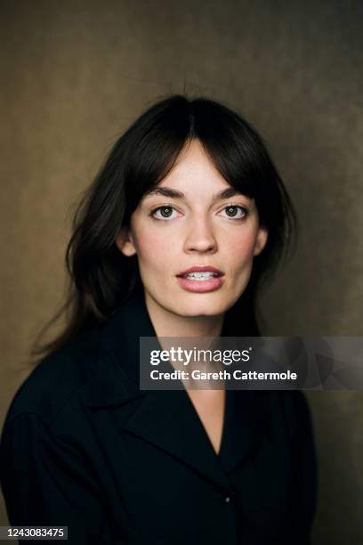 Emma Mackey of "Emily" poses in the Getty Images Portrait Studio Presented by IMDb and IMDbPro at Bisha Hotel & Residences on September 09, 2022 in...