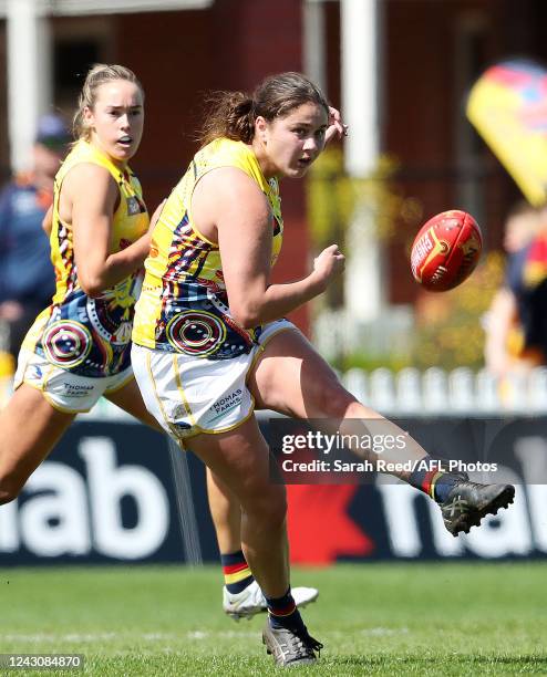 McKenzie Dowrick of the Crows kicks the ball during the 2022 S7 AFLW Round 03 match between the Adelaide Crows and the North Melbourne Kangaroos at...