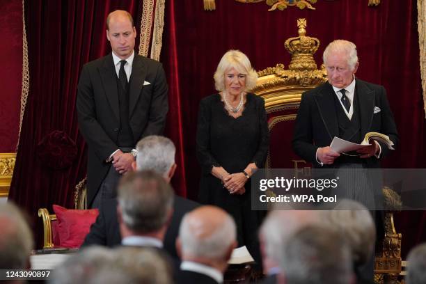 William, Prince of Wales, and Camilla, Queen Consort, look on as King Charles III attends his proclamation as King during the accession council on...