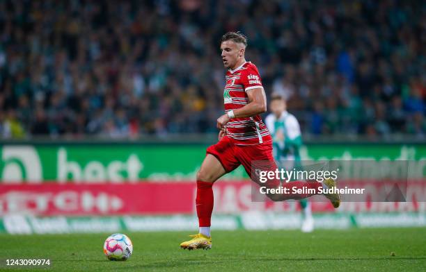 Ermedin Demirovicof Augsburg in action during the Bundesliga match between SV Werder Bremen and FC Augsburg at Wohninvest Weserstadion on September...