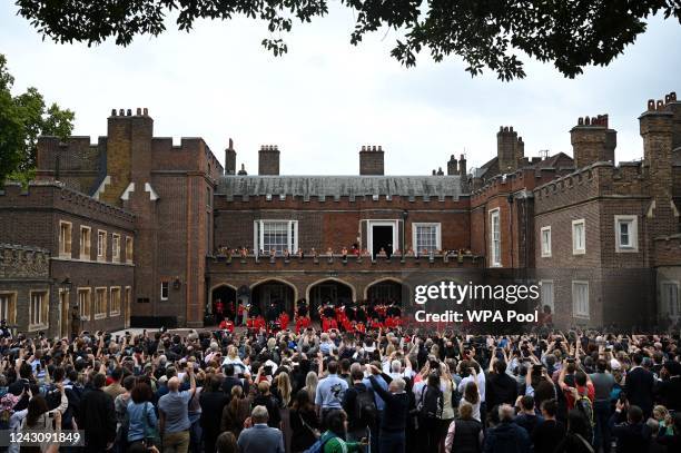 David Vines White, Garter King of Arms reads the Principal Proclamation, from the balcony overlooking Friary Court after the accession council as...