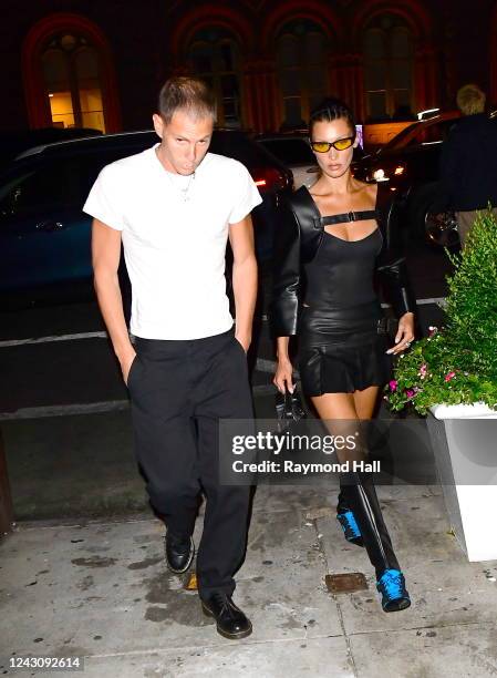 Marc Kalman and Bella Hadid are seen at the Fendi after party on September 9, 2022 in New York City.