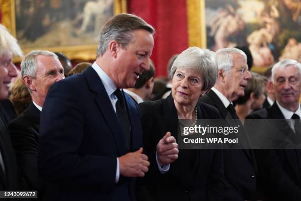 Former prime ministers David Cameron, and Theresa May during the Accession Council ceremony at St James's Palace, London, where King Charles III is...