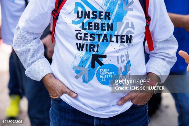 Protester wears a T-shirts reading "We shape our life" during a demonstration of Germany's metal workers union IG Metall in the city centre of...