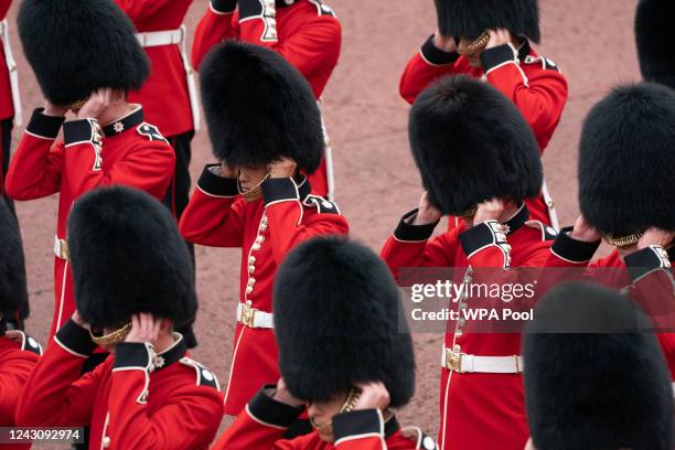 The King's Guard remove their Bearskin hats as King Charles III is proclaimed King during the accession council at St James's Palace on September 10,...