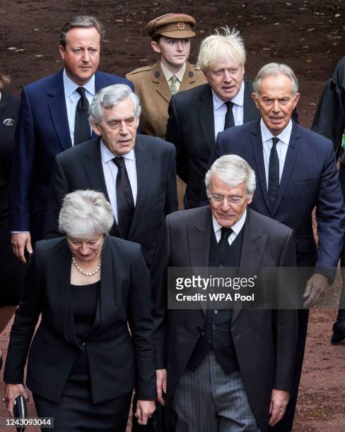 Former British Prime Ministers Theresa May, John Major, Gordon Brown, Tony Blair, David Cameron and Boris Johnson arrive as King Charles III is...