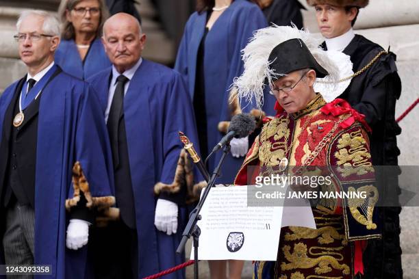 Clarenceux King of Arms, Timothy Duke, reads the secondary Proclamation of Accession of Britain's new King, King Charles III, at the Royal Exchange,...