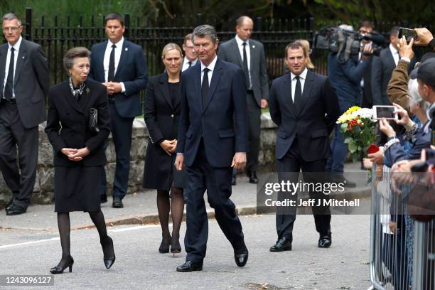 Princess Anne, Princess Royal, Zara Tindall, Vice Admiral Timothy Laurence and Peter Phillips meet well-wishers outside Crathie Kirk church on...