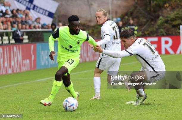 Joseph Boyamba of Munich and Lukas Pinckert of Elversberg battle for the ball during the 3. Liga match between SV 07 Elversberg and TSV 1860 Muenchen...