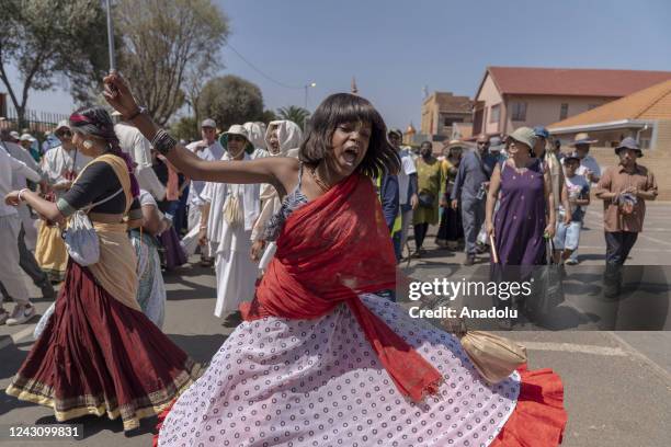 Indians wearing traditional clothes celebrate the Ratha Yatra Festival in Johannesburg, South Africa on September 10, 2022.