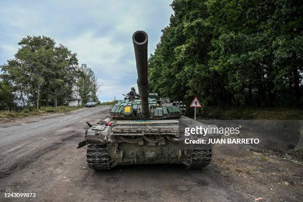 This photograph taken in Balakliya, Kharkiv region, on September 10 , 2022 shows Russian military tank that was captured by Ukrainian forces. -...