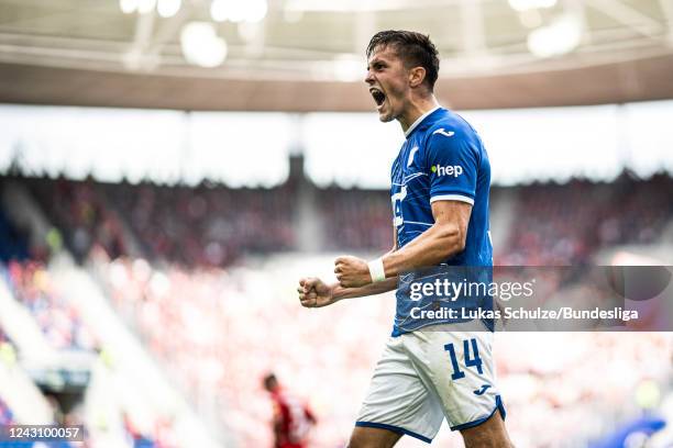 Christoph Baumgartner of Hoffenheim celebrates his teams second goal during the Bundesliga match between TSG Hoffenheim and 1. FSV Mainz 05 at...