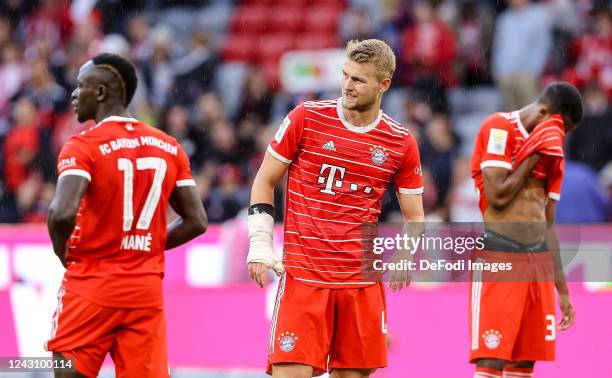 Sadio Mane of Bayern Muenchen, Matthijs de Ligt of Bayern Muenchen and Ryan Gravenberch of Bayern Muenchen looks dejected after the Bundesliga match...