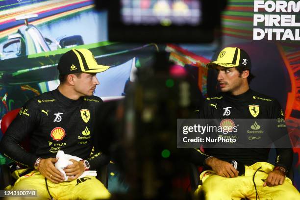 Charles Leclerc and Carlos Sainz of Scuderia Ferrari during a press conference after qualifying at the Formula 1 Italian Grand Prix practice three at...