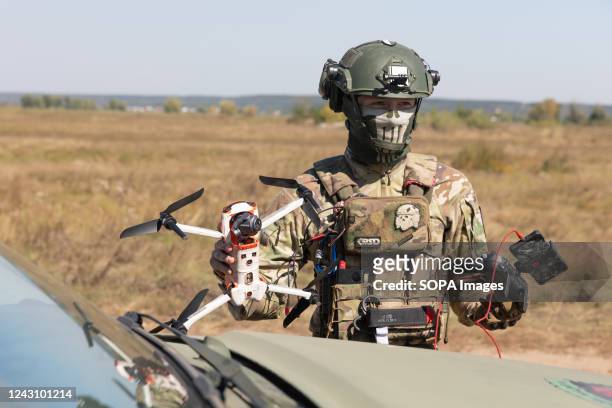 Drone operator from the field medicine division Hospitallers is seen preparing to launch a quadrocopter to search for the wounded on the battlefield....