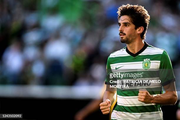 Sporting's Portuguese forward Francisco Trincao celebrates after scoring against Portimonense SC during the Portuguese League football match between...