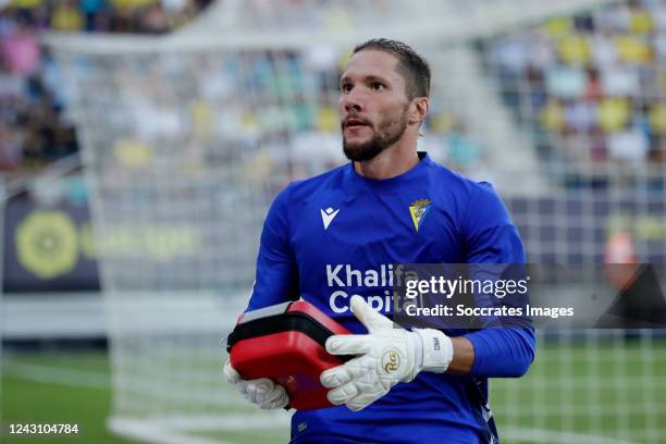 Jeremias Conan Ledesma of Cadiz CF brings a suitcase for the outcome of a supporter who is having a heart attack on the stands during the match...