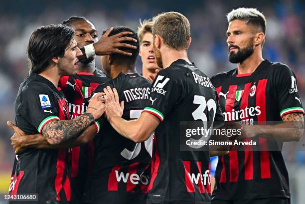 Junior Messias of Milan celebrates with his teammates after scoring the first goal of his team during the Serie A match between UC Sampdoria and AC...