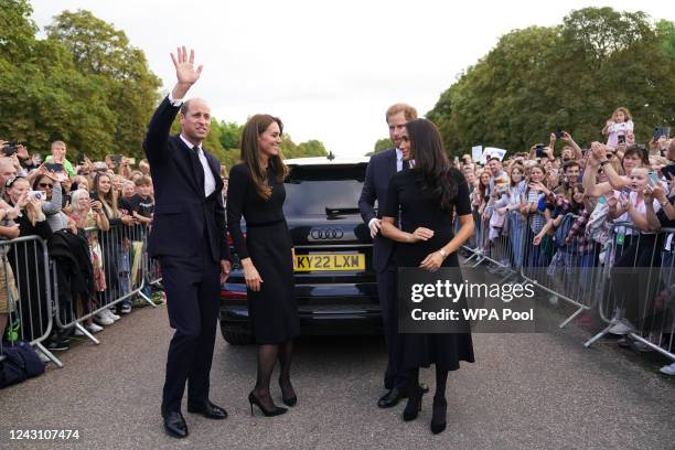 Catherine, Princess of Wales, Prince William, Prince of Wales, Prince Harry, Duke of Sussex, and Meghan, Duchess of Sussex meet members of the public...