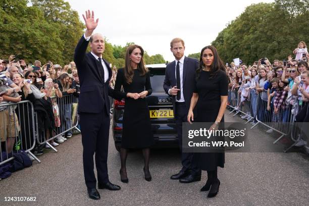 Catherine, Princess of Wales, Prince William, Prince of Wales, Prince Harry, Duke of Sussex, and Meghan, Duchess of Sussex meet members of the public...