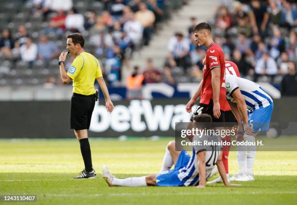 Referee Benjamin Brand blows the final whistle during the Bundesliga match between Hertha BSC and Bayer 04 Leverkusen at Olympiastadion on September...