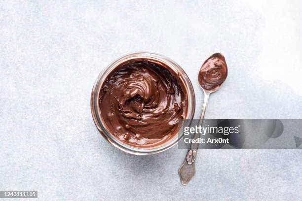 chocolate nut butter jar - nutella stock pictures, royalty-free photos & images