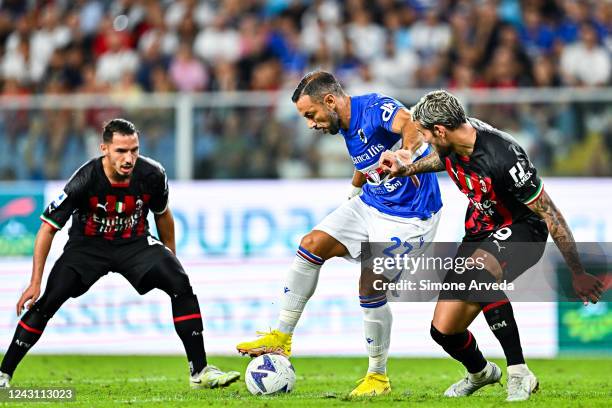 Fabio Quagliarella of Sampdoria vie for the ball with Ismael Bennacer and Theo Hernandez of Milan during the Serie A match between UC Sampdoria and...