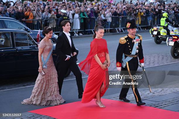 Crown Prince Frederik and Crown Princess Mary with their children Princess Isabella and Prince Christian arrive for a command performance at the...