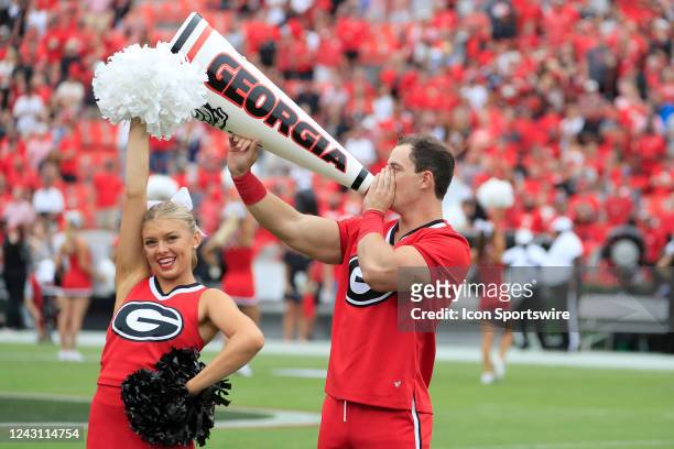 Cheerleaders perform before the Saturday afternoon college football game between the defending National Champion Georgia Bulldogs and the Samford...