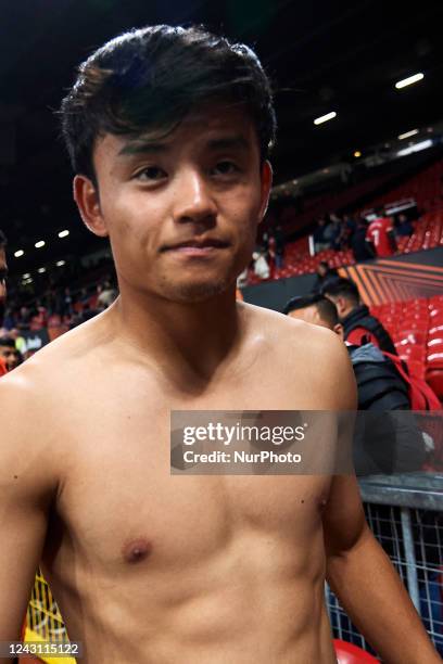 Takefusa Kubo right winger of Real Sociedad and Japan celebrates victory after the UEFA Europa League group E match between Manchester United and...